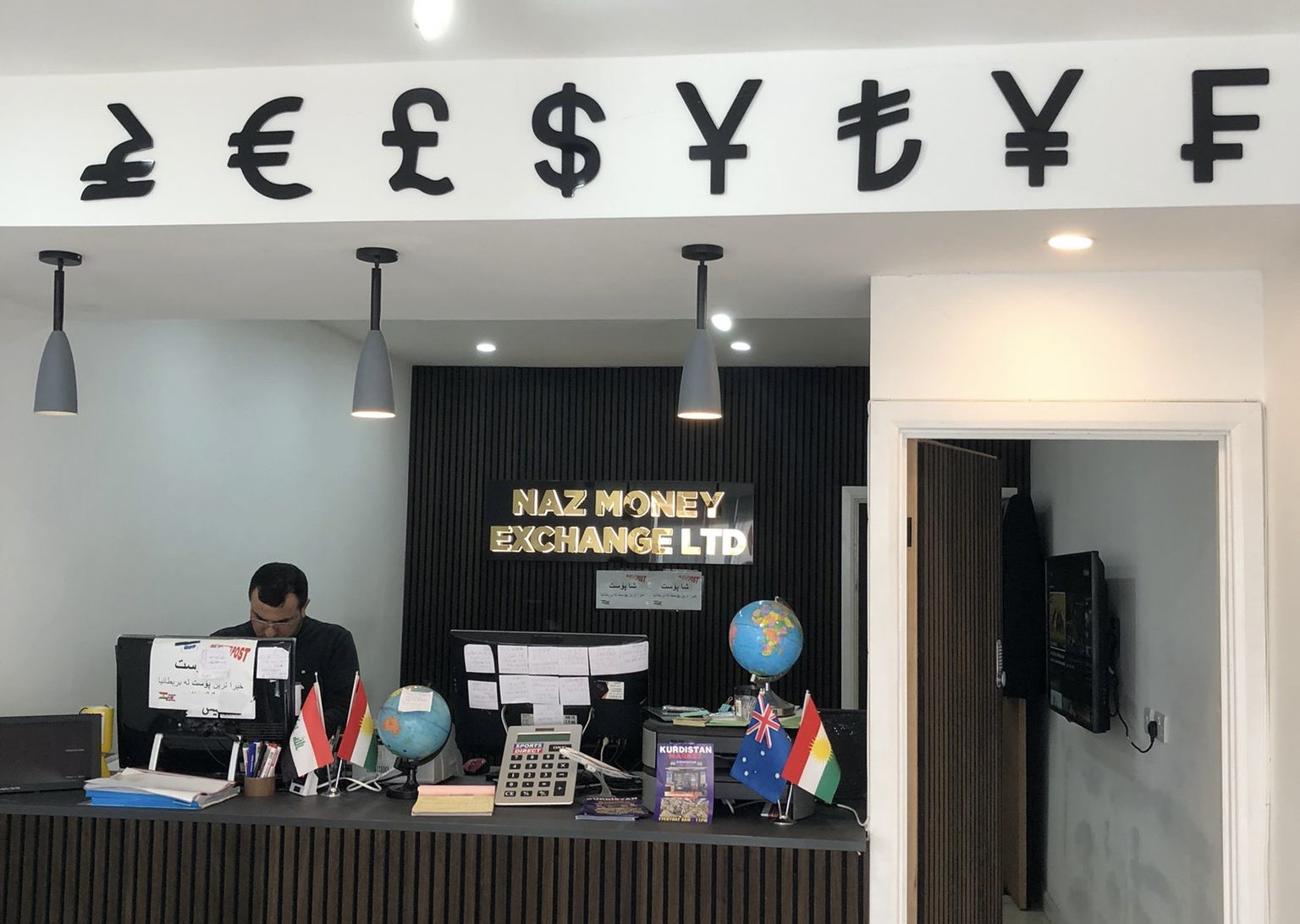 The inside of the office of Naz Money Exchange, based in Wolverhampton.